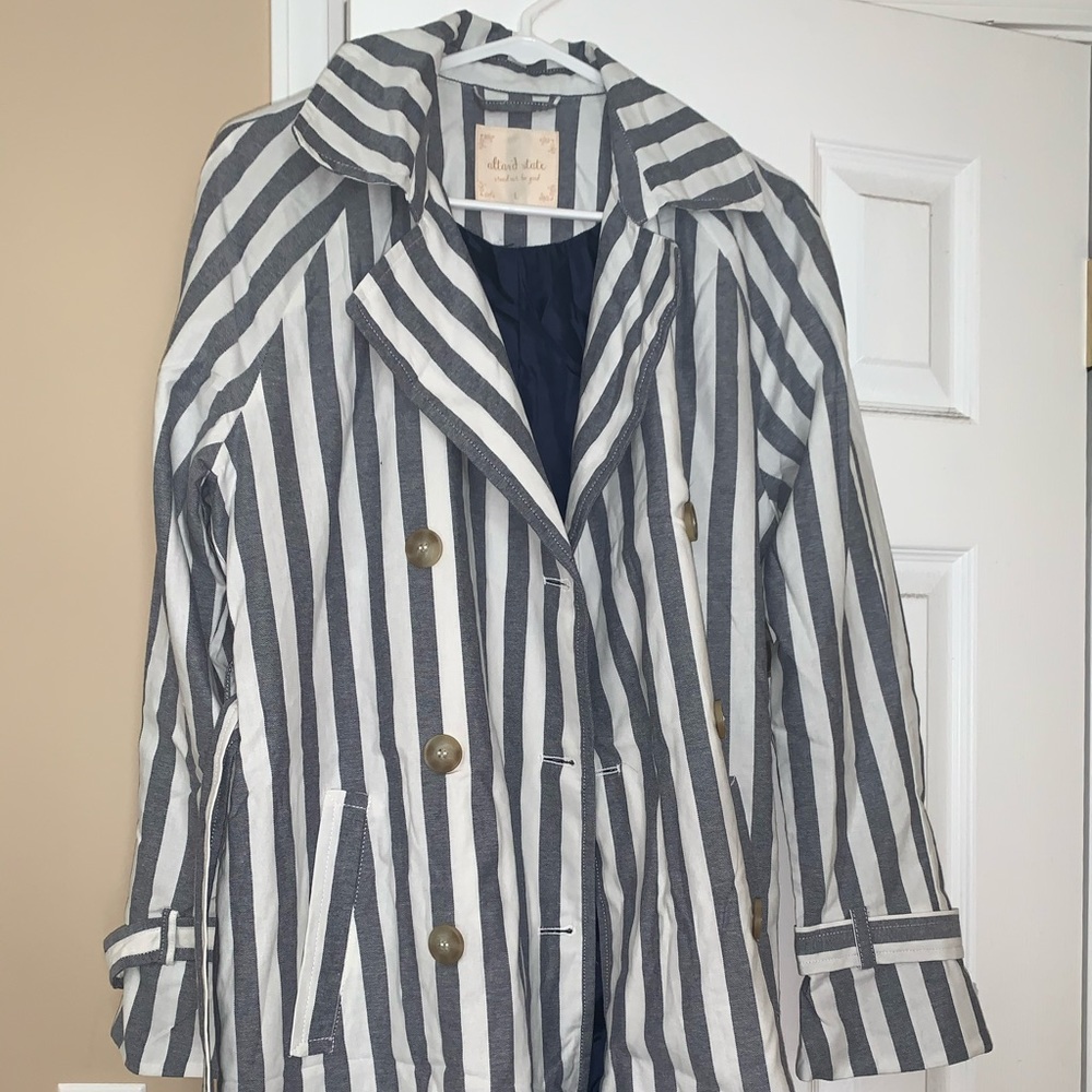 Blue and white striped trench coat.